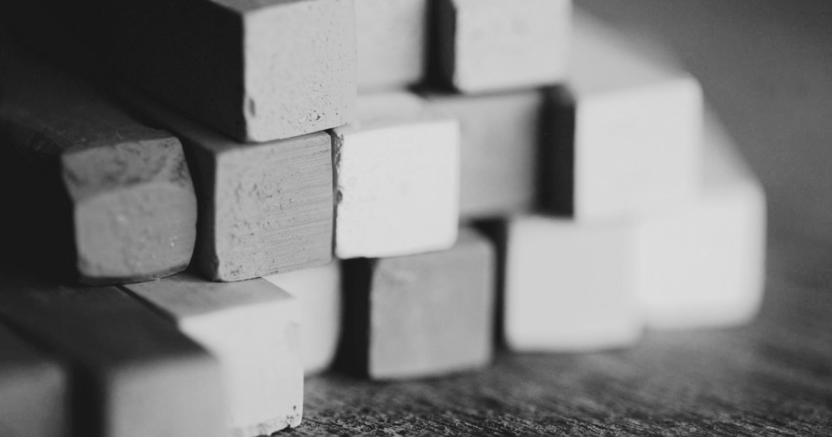 Stacked blocks representing WordPress plugin accumulation and the complexity it creates
